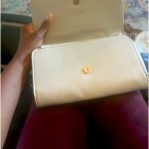 White crossbody dress bag.